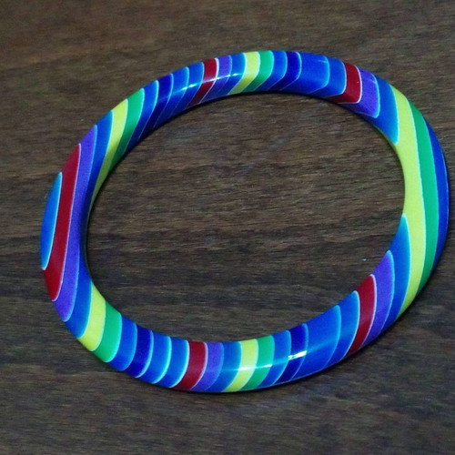 Set of 7 used neon rainbow resin bracelets 70s style
