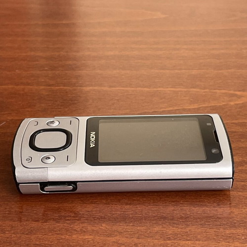 Nokia 6700s phone used with metal body and original battery