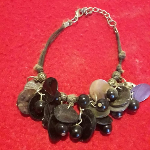 Bracelet with cord and large sequins like new, black and gray