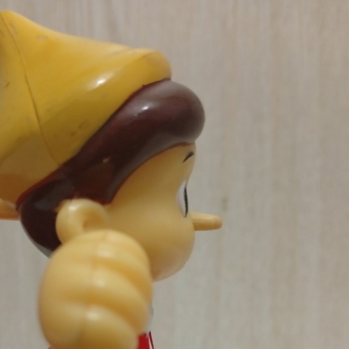 Pinocchio figure with nose mechanism, used