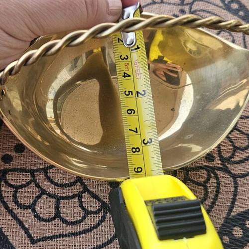 Brass decorative bowl with handle