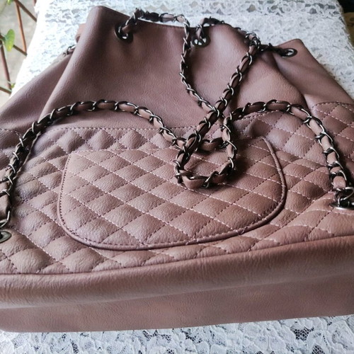 Backpack like new with quilted texture and handles