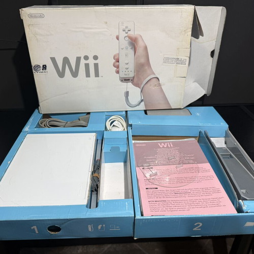 Nintendo Wii console used, boxed with black controller