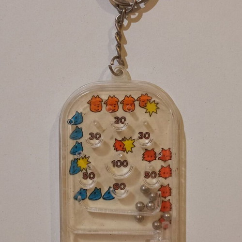 Vintage Goody's Decorative Keychain Flip Game Used