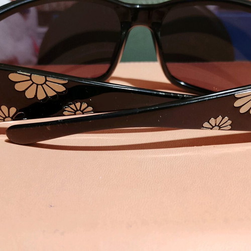 Miu Miu sunglasses used with case and cloth, black and gold