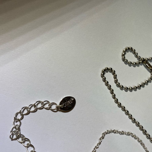 Claire's necklace like new with thin chain and half heart design
