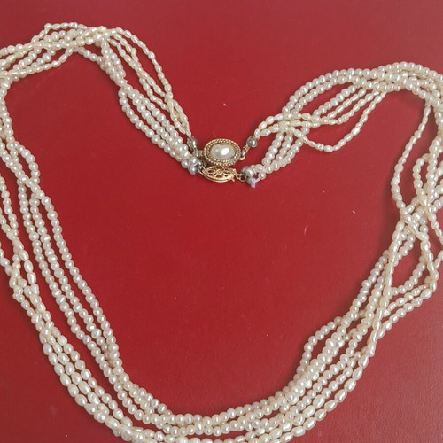 Two freshwater pearl necklaces with gold and metal clasps