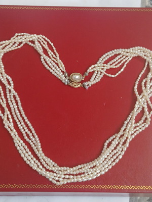 Two freshwater pearl necklaces with gold and metal clasps