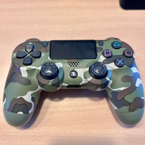 PS4 Slim 500GB console with 2 DualShock 4 controllers and Chimparty game
