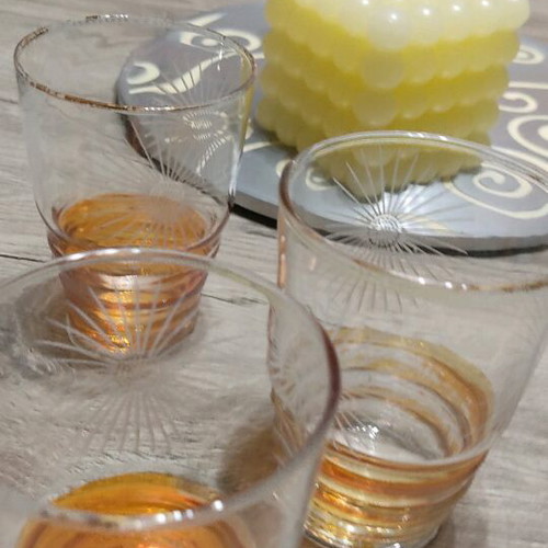 Vintage glasses set of four like new with gold design