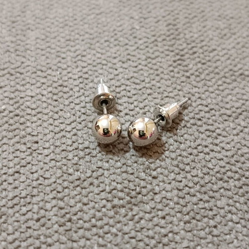 Set of six pairs of earrings new, three dangling and three small