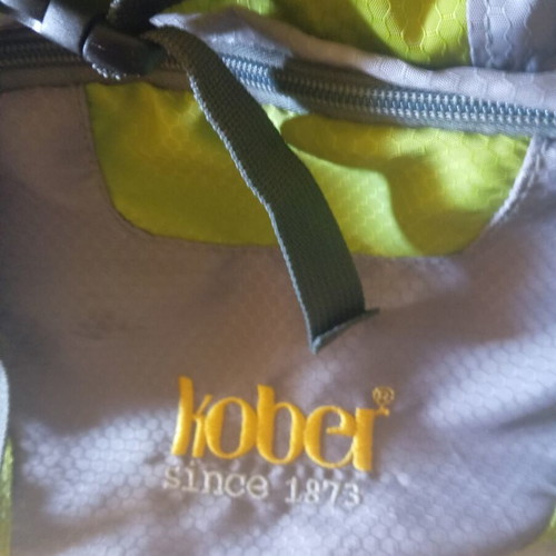 Backpack Kober used, top flap detached needs sewing