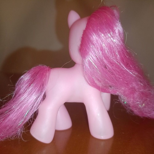Pink My Little Pony Style Unicorn figure used with glitter hearts