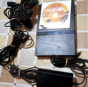 Κονσόλα PS2 SLIM με χειριστήριο και καλώδια σύνδεσης συν ένα παιχνίδι δώρο και τροφοδοτικό ρεύματος.