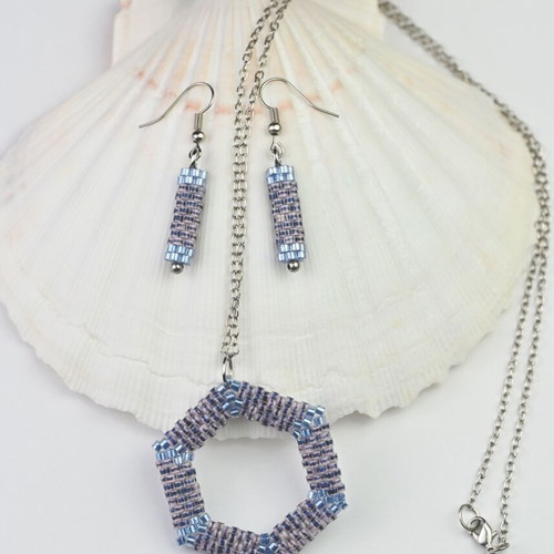 Custom-made jewelry set in light blue tones with hexagonal pendant