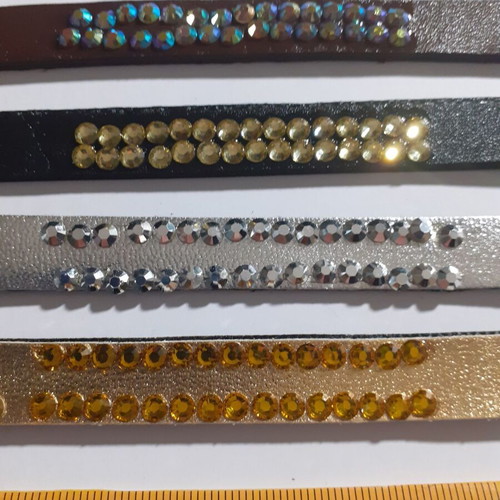 Pack of 235 denim and faux leather bracelets with rhinestones