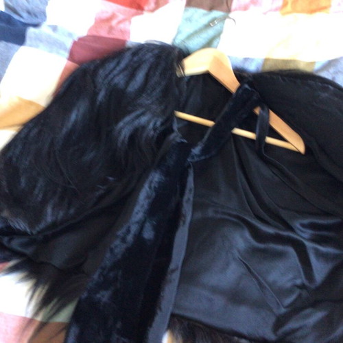 Vintage chimpanzee fur cape with satin lining and velvet ribbons