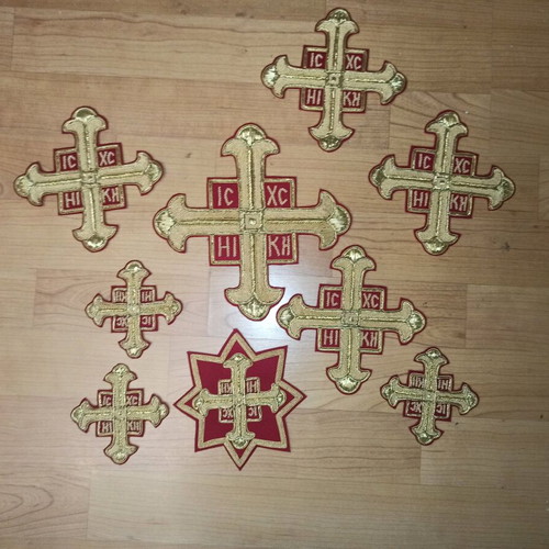 Set of 9 new ecclesiastical crosses with gold embroidery on red fabric
