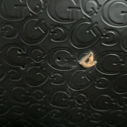 Guess suitcase used with missing front emblem