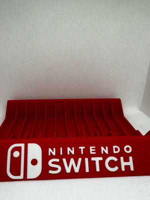 Nintendo Switch game cartridge stand like new