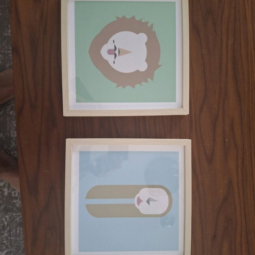 Set of 2 children's frames Lion and Sloth like new, minimal design