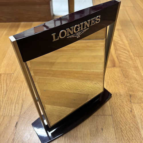 Longines mirror used with minor paint wear, wooden frame