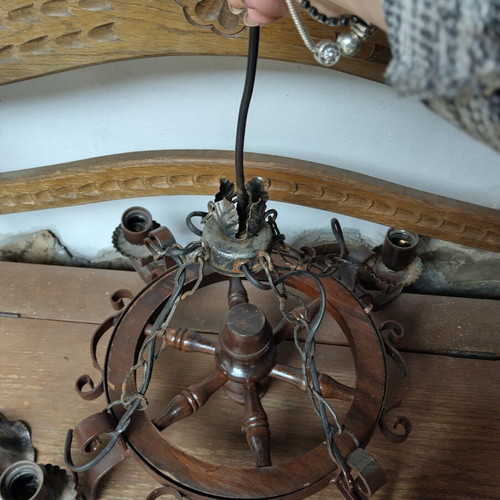 Chandelier made of wrought iron like new, rustic style with wood