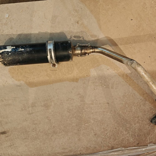 Race Tech exhaust used, no dents, needs painting