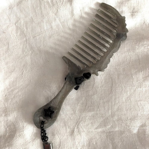 Goth comb like new, epoxy resin with charms
