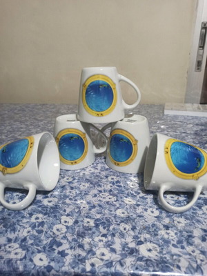 Illusion porcelain mugs set of 5 like new