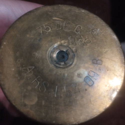 Bronze carved shell casing like new