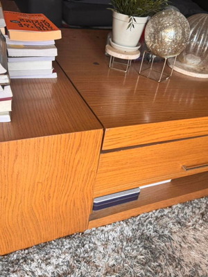 Coffee table like new with large drawer and shelf