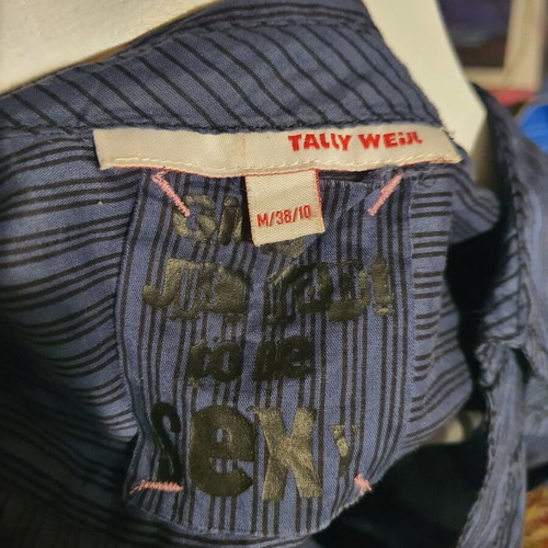 Thin shirt with black stripes and V neckline like new