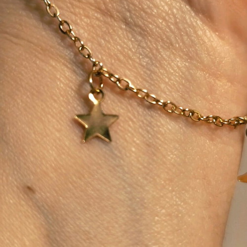 Double necklace in gold color like new with stars and crescent moons