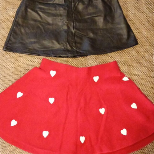 Girls' skirts like new, leather and red heart print, size 8 years