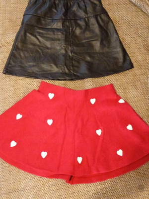 Girls' skirts like new, leather and red heart print, size 8 years
