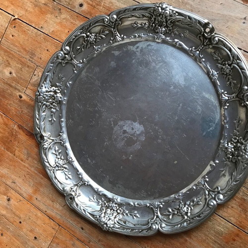 Silver-plated round disc used with age damage
