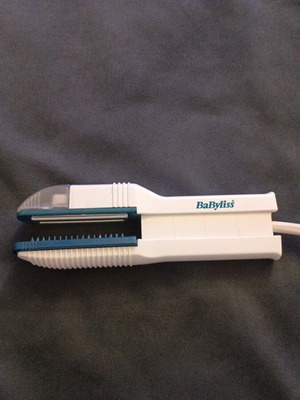 Babyliss hair straightener used with steam container and ceramic plates