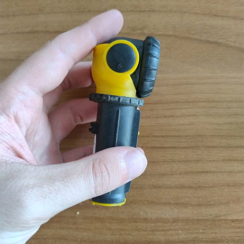 Portable flashlight with adjustable head used