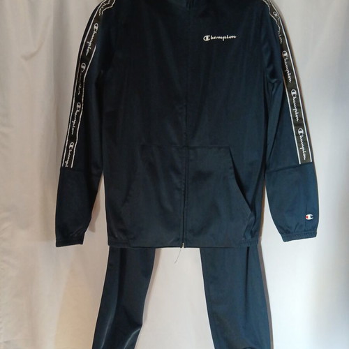 Champion tracksuit like new with small almost invisible knee defect