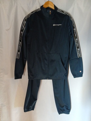 Champion tracksuit like new with small almost invisible knee defect