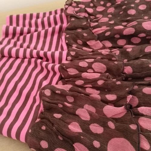 Women's skirt pink and brown like new, size small