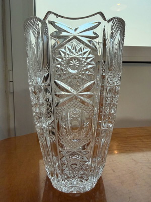 Vintage glass vase with embossed design used
