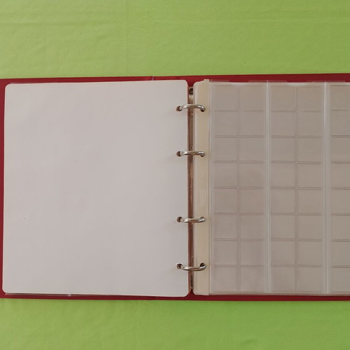 Coin album used with 5 slides for 133 coins