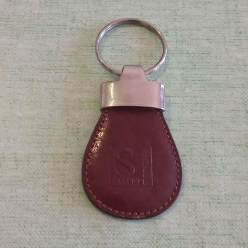 Smart Press by Mihail leather keychain like new