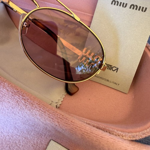 Miu Miu SMU 54ZS ZVN-70D sunglasses like new, gold frame, pink lenses
