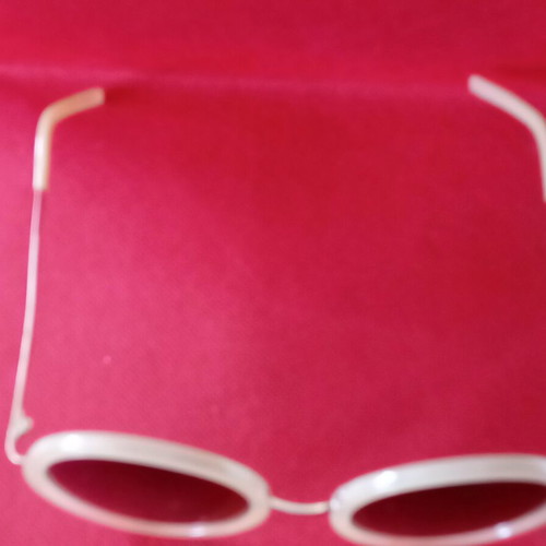 Sunglasses used, beige color