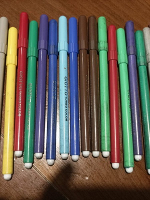 Various school supplies used with Giotto markers and pencil cases