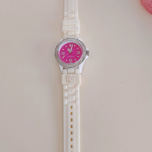 Ice Watch wristwatch used with pink dial missing 2-3 diamonds
