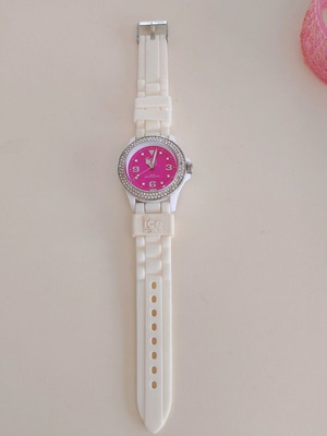 Ice Watch wristwatch used with pink dial missing 2-3 diamonds